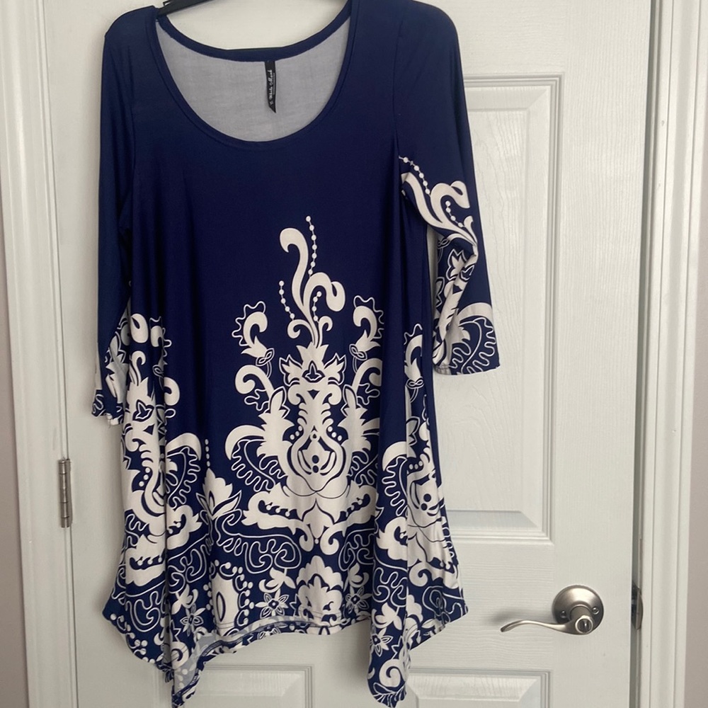 BRAND NEW white and blue dress white a pattern on it